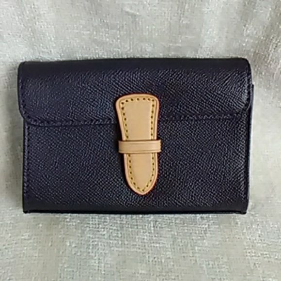 ⌛️ CLEARANCE  - Authentic Dooney & Bourke pouch - Picture 1 of 4